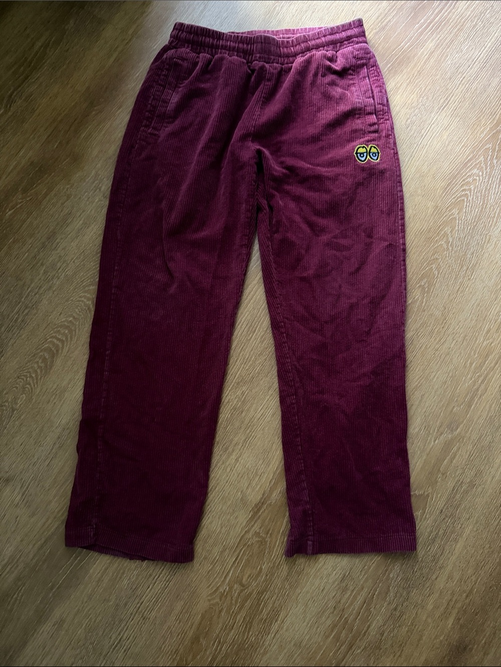 Men's Corduroy Pants in Deep Burgundy with Embroidered Detail